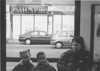 mauritanian family waiting for a delayed sunday bus