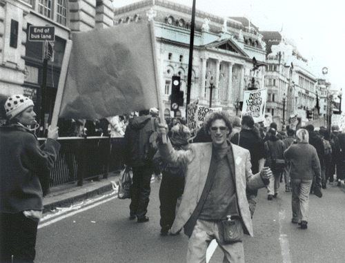 happy man arriving on piccadilly circus